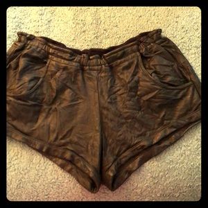 Black leather shorts with elastic waistband